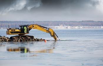 How Does Dredging Stop Beach Erosion?